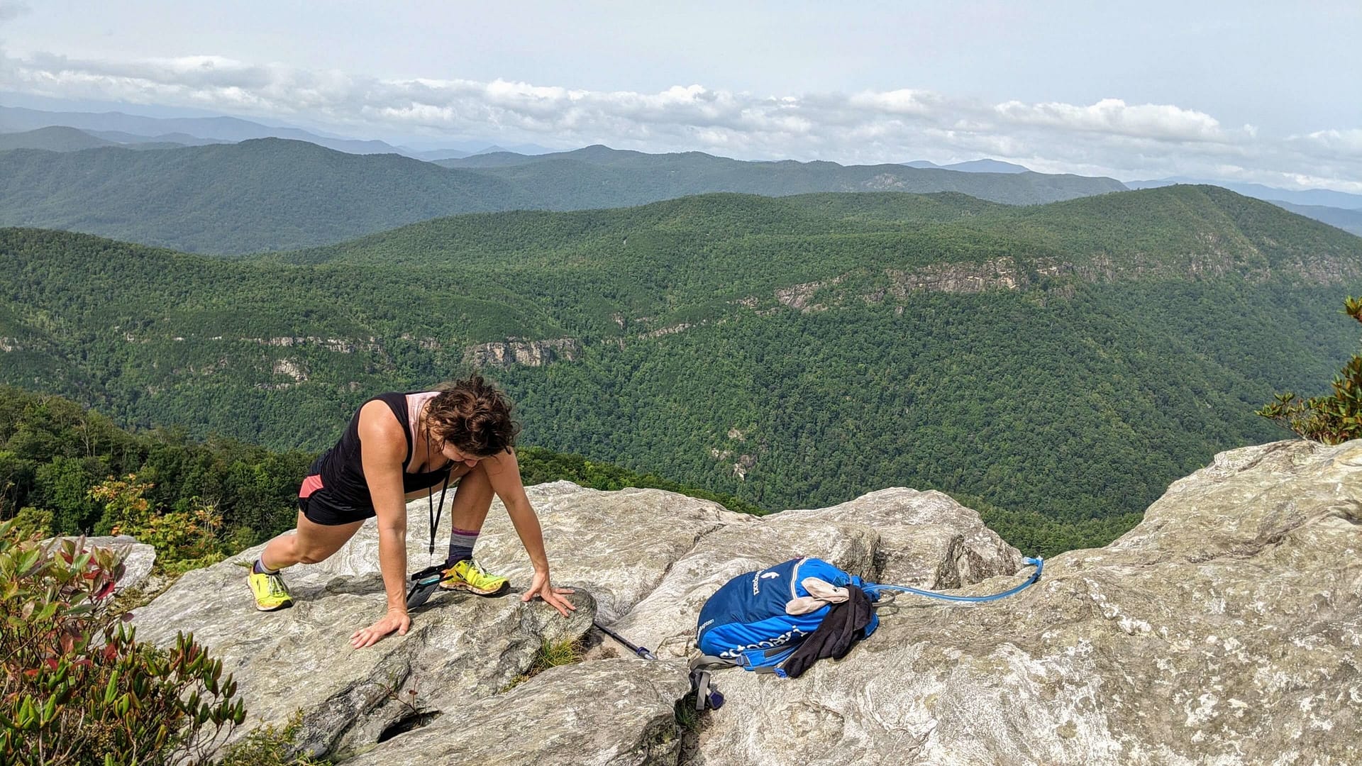 taking a stretch break on top of table rock at linville gorge