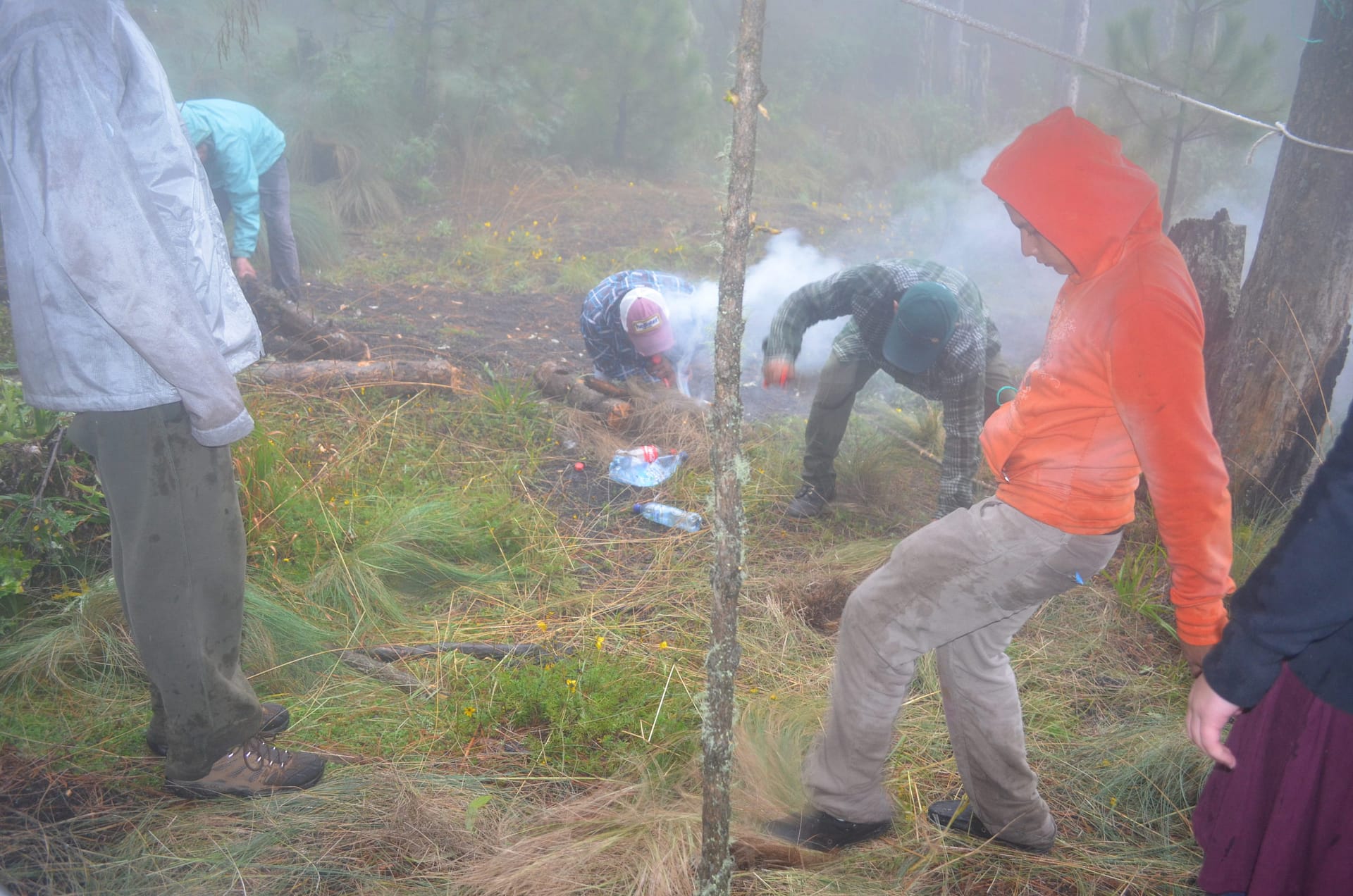 Building a fire and making camp at volcan acatenango Guatemala